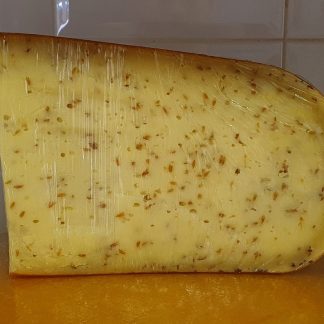 Queso con comino. Un kilo de queso Gouda artesanal con semillas de comino